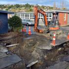 Alastair Bowen, of Island Park Contractors, digs a hole at Dunedin's Kaikorai Valley College, in...