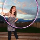Showing her hula hoop style is Albie Haynes (10), of Wanaka, in Wanaka on Christmas Day. Photo by...