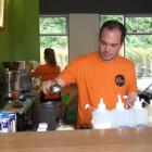 Alex Grant whips up a Frozen Monkey Relapse in the blender. Photo by Christina McDonald.