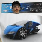 Alex Hodge holds up a drawing of the Hawk concept vehicle he would like to see produced. Photo by...