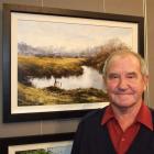 Alexandra artist Denis Kent with his winning entry in the Blossom Festival art exhibition. Photo...