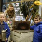 Alexandra Primary School pupils (left) Madie Hill (7) holding a bee smoker and (right) Quin...