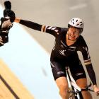 Alison Shanks celebrates her win in the women's individual pursuit. (Photo by Mark Dadswell/Getty...