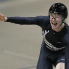 Alison Shanks celebrates winning the women's individual pursuit at the world championships in...