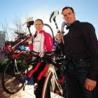 Alison Shanks (left) and Mark Falcous celebrate their BikeNZ awards with a cycle ride yesterday....