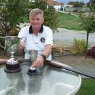 Alistair Stuart with the two trophies he has won for the same clay target shooting event, the...