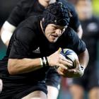 All Black captain Richie McCaw heads for the tryline to score his side's only try in the 22-16...