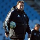 All Black coach Steve Hansen keeps an eye on proceedings during team training at Carisbrook, in...