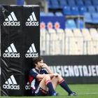 All Black Conrad Smith takes time out during the captains run at Eden Park. Photo by NZPA.