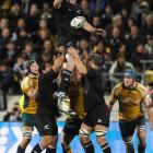 All Black lock Tom Donnelly is lifted in the line-out during his side's 33-6 win in the Tri...