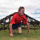 Allan Paterson, of Gimmerburn, tackles the obstacle course during the Maniototo Community Cup...