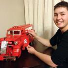 am Butcher adds another brick to the scale model Texaco tanker he is building for Invercargill's...