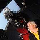 Amateur astronomer Ash Pennell takes a close look at Venus through the main telescope at the...