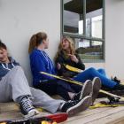 An ''injured'' Josey Jefferson (15), of Lauder, listens to her similarly injured friends Olivia...