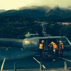 An Air Force helicopter prepares to help locate two Auckland climbers stuck on Mt Taranaki for...