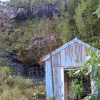 An entrance to a  historical  underground coal mine on the  Denniston Plateau escarpment, which...