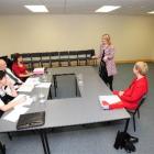 Andrea Ludemann (standing) and Larina Tiffen present their pitch to Ali Copeman, Tony Crick and...