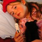 Andersons Bay School pupil Abby Grimaldi (5) recovers at home from flu and fever. She is one of...