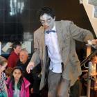 Andersons Bay School pupil Jake Remon (left, 10) joins the zombie tour led by science...