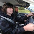 Andrew Henderson receives professional tuition from driving instructor Jim Pine at St Kilda....