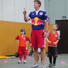 Andy Boyens instructs some youngsters at the Sunnyvale gymnasium yesterday as Lydia Wyllie (7)...