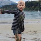 Angus Beaton  plays at Akaroa Beach on Saturday after receiving good news from the doctor.  Photo...