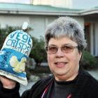 Ann Dennison with her household waste from July  - a little more than her usual monthly rubbish....