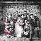 Anna Deans and Colin Lee with their bridal party at their wedding, which took place on Anna's...