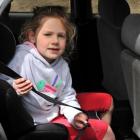 Annabelle Batchelor (6) in a car seat in Dunedin yesterday. Photo by Craig Baxter.
