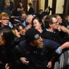 Anti-Trans Pacific Partnership protesters try to disrupt a National Party event in Dunedin last...