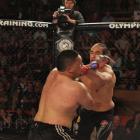 Apii Taia (left) and Bishop Poi Poi go at it during a South Island title fight at Dunedin's...