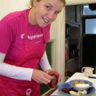 Criterion Club Hotel employee Catherine Lee prepares Weight Watchers-approved meals for her Pink...