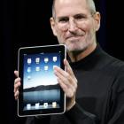 Apple CEO Steve Jobs holding up the new iPad during a product announcement in San Francisco.  (AP...