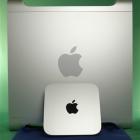 Apple's new Mac Mini, it's smallest and cheapest computer, is shown next full-size Mac Pro...