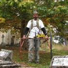 Archaeologist Hans-Dieter Bader uses ground-penetrating radar to find unmarked graves in the St...