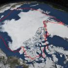 Arctic sea ice hits its annual minimum as seen in this satellite picture. The red line  shows the...