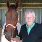 Ares and trainer Michael Cunningham after the colt's win on debut at Ascot Park  on Thursday....