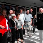 Arrowtown Bowling Club life member Taylor Reed cuts the  ribbon on  the  building's new $150,000...