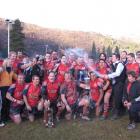Arrowtown players and management celebrate their 23-13 win against Upper Clutha in last year's...