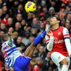 Arsenal's Andre Santos (R) and Queens Park Rangers' Shaun Wright-Phillips challenge for the ball...