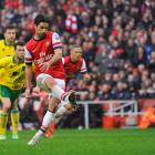 Arsenal's Mikel Arteta shoots to score against Norwich City during their English Premier League...