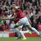 Arsenal's Robin van Persie, right, celebrates with Theo Walcott after scoring against Sunderland...