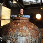 Artist Hannah Kidd in one of the pots she has produced for the play <i>Play</i> being produced by...