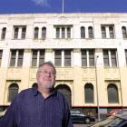 Assoc Prof Alexander Trapeznik outside the old NMA building on the corner of Water St.