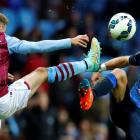 Aston Villa's Andreas Weimann (L) challenges Manchester City's Pablo Zabaleta during and English...