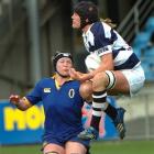 Auckland lock and captain Vicky Heighway catches the ball while Otago Spirit flanker Erin Bailey...