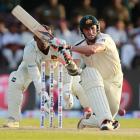 Australia's Michael Hussey plays a shot on the first day of first test against Sri Lanka in Galle...