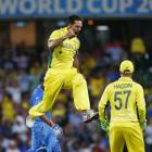 Australia's Mitchell Johnson celebrates after bowling out India's Rohit Sharma. REUTERS/David Gray