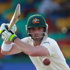 Australia's Phillip Hughes watches a shot as he works towards a century against Sri Lanka  during...
