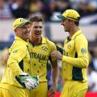 Australia's wicketkeeper Brad Haddin (L) celebrates with team-mates James Faulkner (2nd L) and...